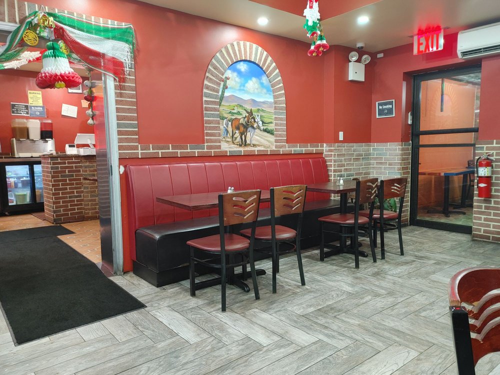 Warm dining room inside Taquitos Mexico